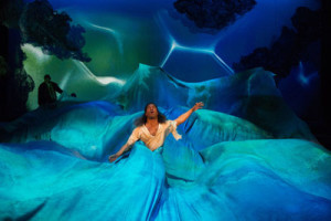 Pericles (Wayne T. Carr) emerges in the roiling sea after his ship is wrecked in OSF’s Pericles.