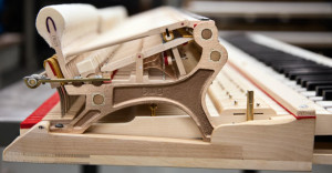 This is a Steinway photo of their patented “Accelerated Action” mechanism, which makes Steinway pianos more sensitive and responsive than any others. Steinway recently has been making and offering for sale Grand Pianos with more than one action mechanism, the different actions designed to customize the sound of the instrument. S.O.U. bought the first of these grand pianos with dual actions – one action designed for soft chamber music and another for commanding concerto music.